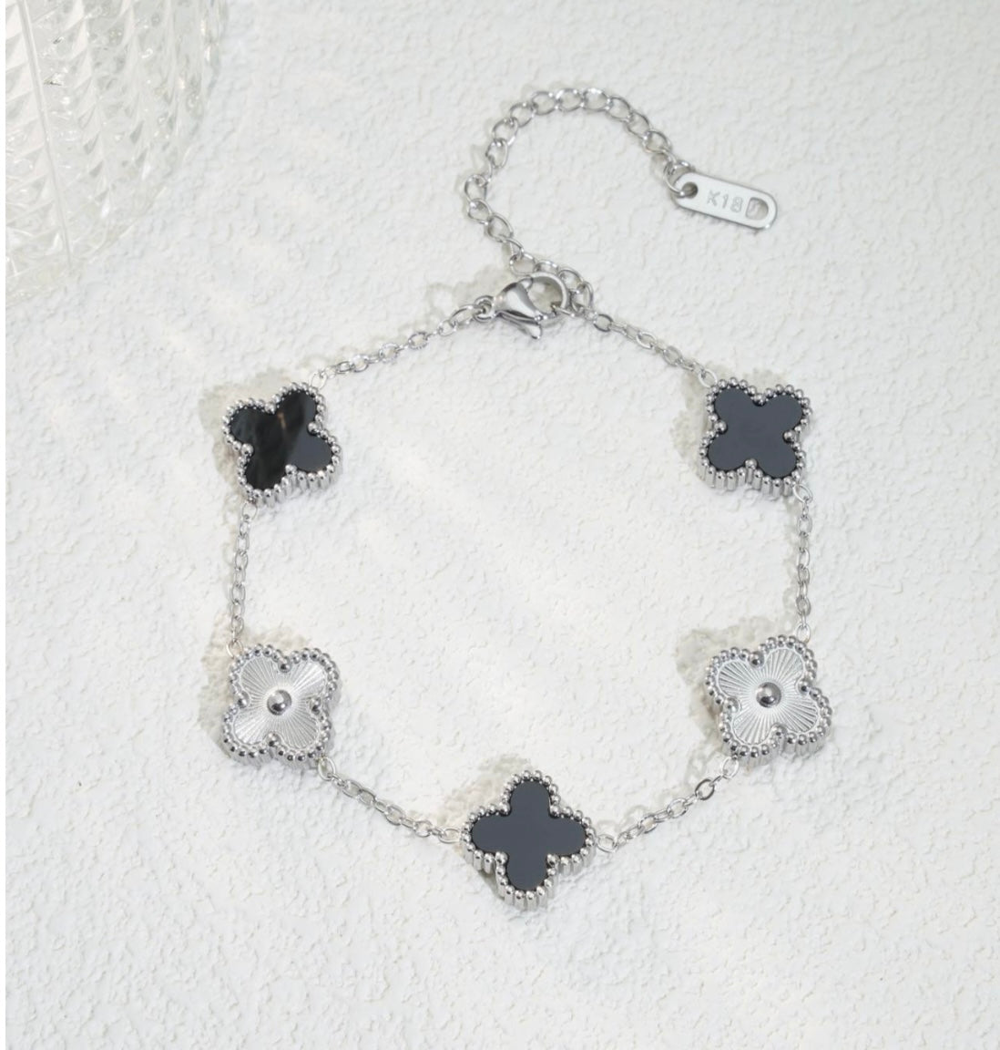 Bracciale ‘quadrifoglio nero argento’.
